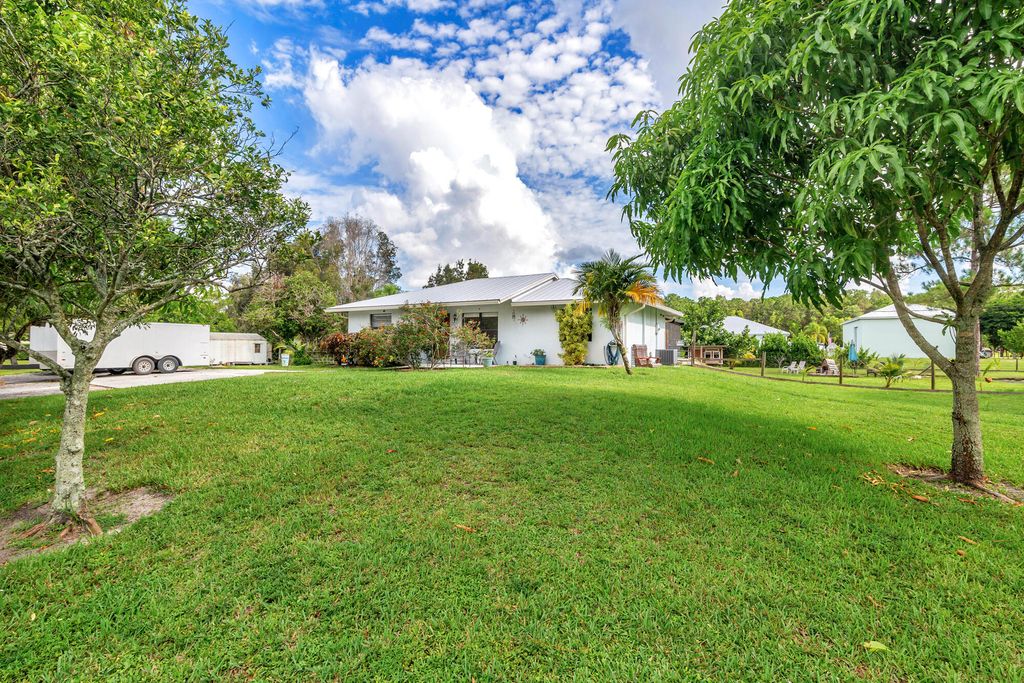 Photo of 13925 78th Place N, The Acreage, FL 33412 (MLS # R11006154)