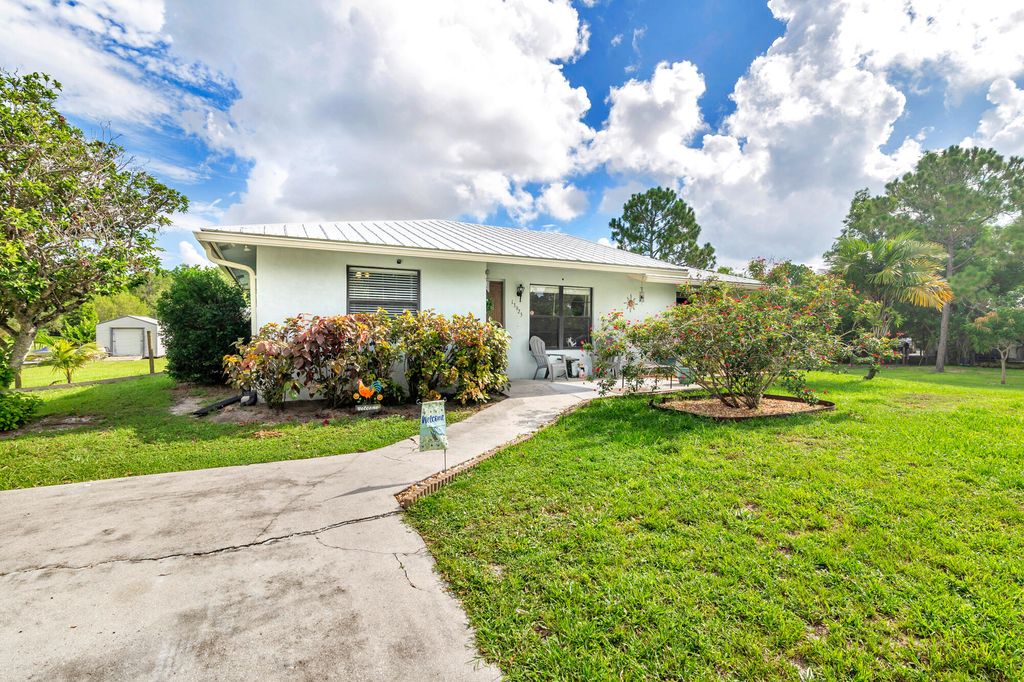 Photo of 13925 78th Place N, The Acreage, FL 33412 (MLS # R11006154)