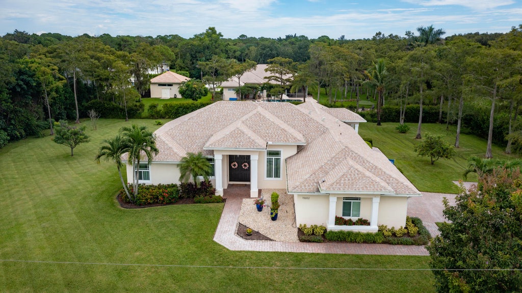Photo of 15652 86TH Way N, Palm Beach Gardens, FL 33418 (MLS # B26074460)