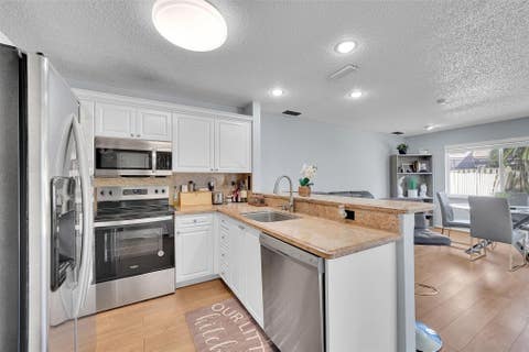 Tiny photo for 10615 NW 12th Court, Plantation, FL 33322 (MLS # B26035253)