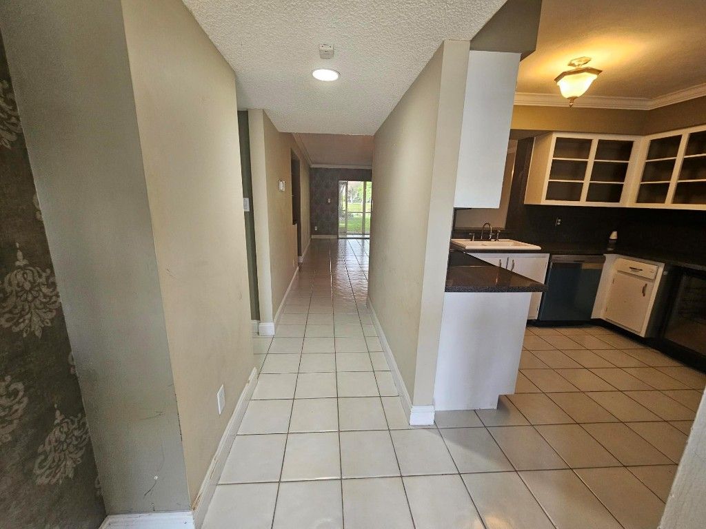 Photo of 2214 S Cypress Bend Drive #105, Pompano Beach, FL 33069 (MLS # F10545893)