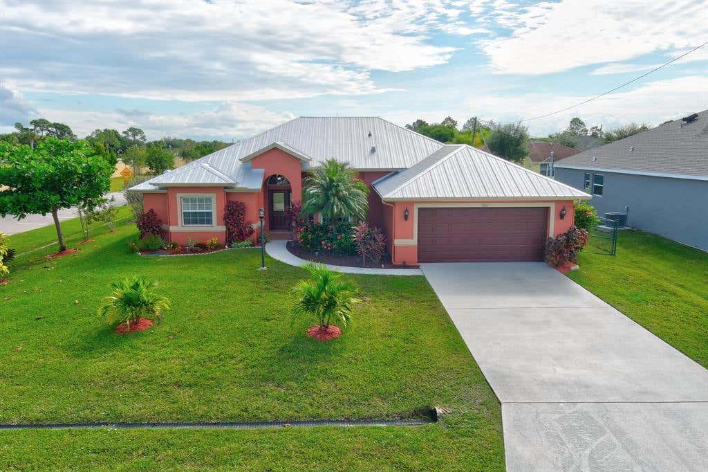 Photo of 1601 SW Realty Street, Port Saint Lucie, FL 34987 (MLS # R10748128)