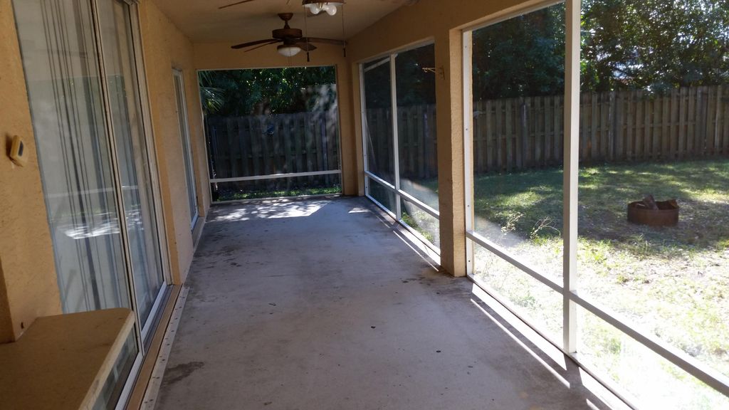 Photo of 1672 SW Pleasant Lane, Port Saint Lucie, FL 34984 (MLS # B26016449)