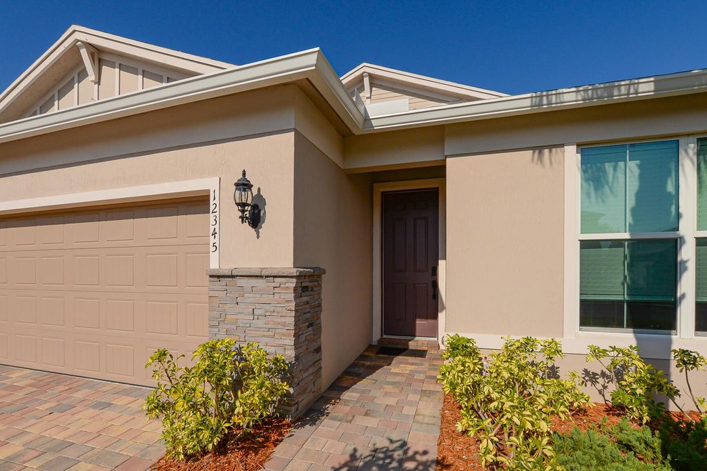 Photo of 12345 SW Sand Dollar Way SW, Port St Lucie, FL 34987 (MLS # R11083000)