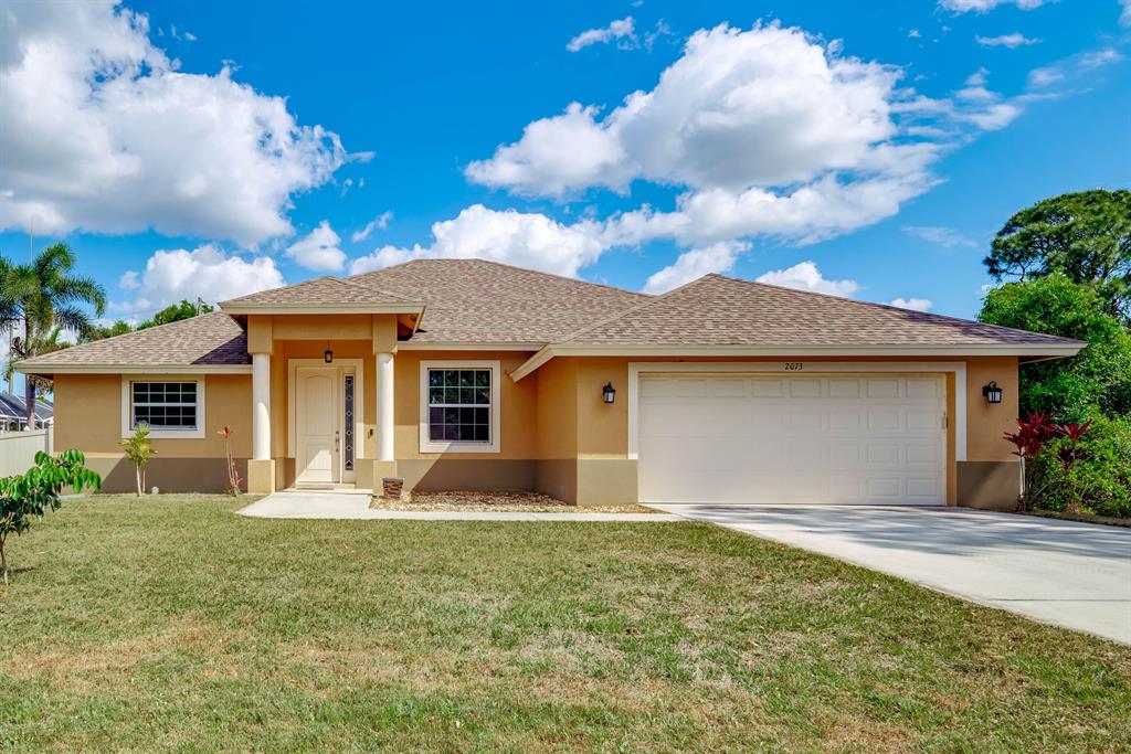 Photo of 2073 SW Grant Avenue, Port Saint Lucie, FL 34953 (MLS # R10705771)