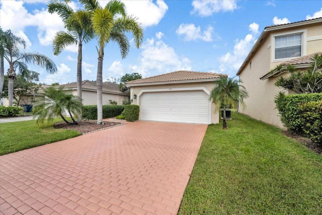Photo of 114 Prestige Drive, Royal Palm Beach, FL 33411 (MLS # R11133476)