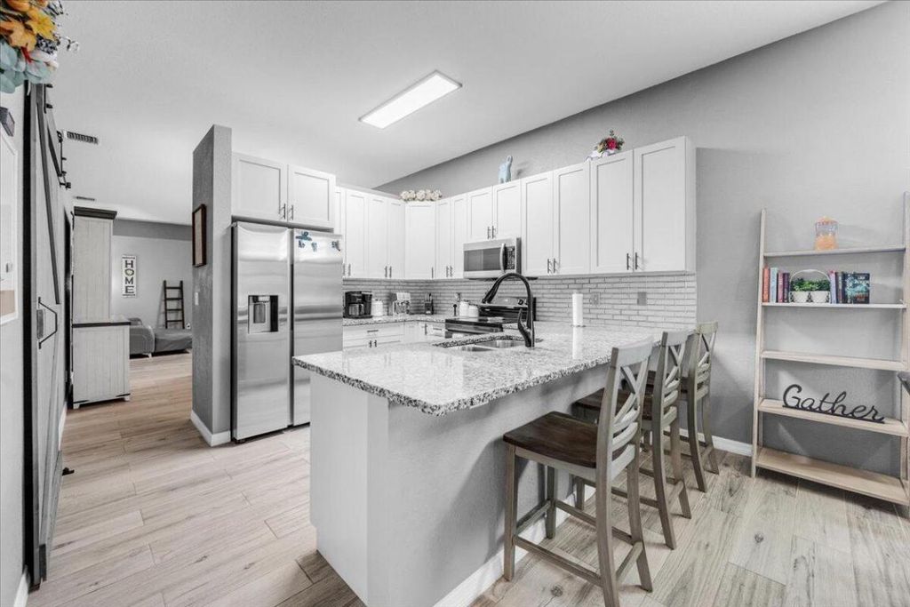 Photo of 114 Prestige Drive, Royal Palm Beach, FL 33411 (MLS # R11133476)