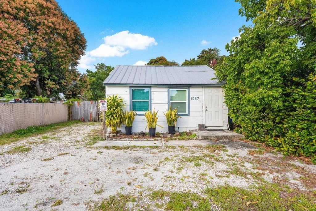 Photo of 1047 Miner Road, Lake Worth, FL (MLS # R11036280)