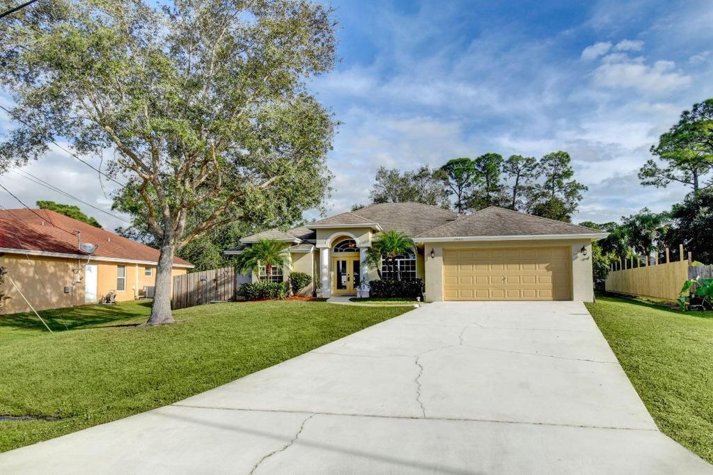 Photo of 2485 SW Madiera Street, Port Saint Lucie, FL 34953 (MLS # R10941744)