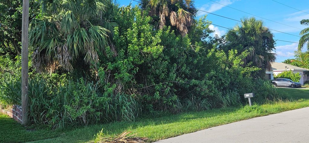 Photo of 1225 SW Ackard Avenue, Port Saint Lucie, FL 34953 (MLS # R11108235)