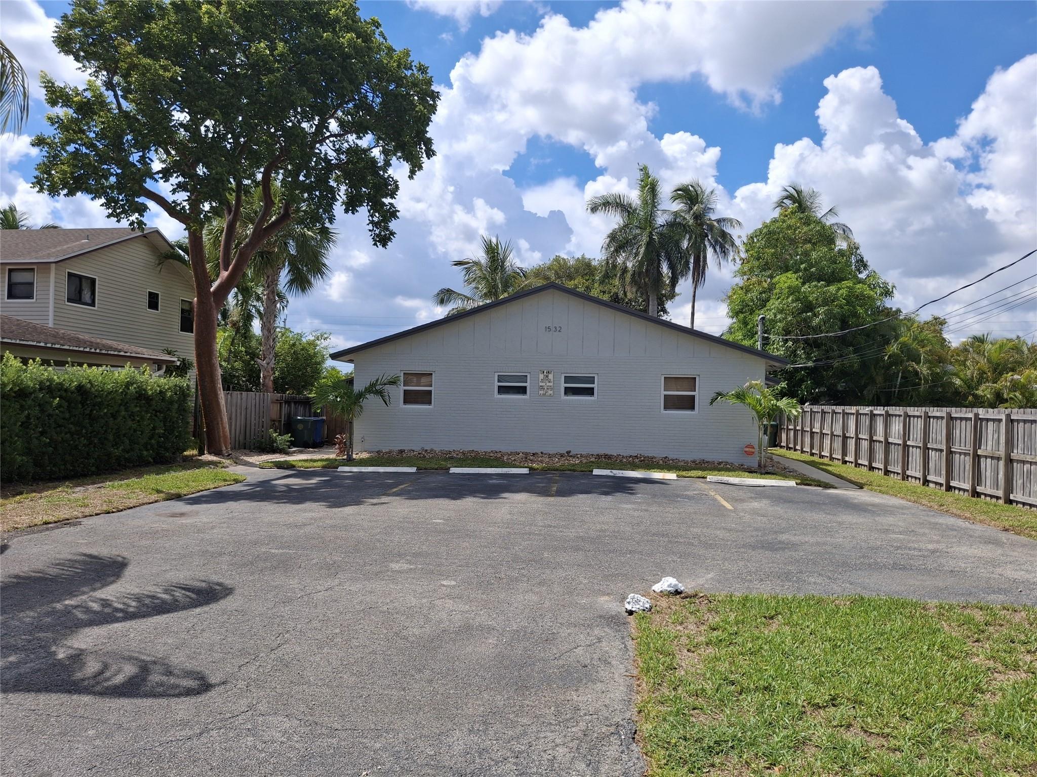 2/2 RENTAL Prime location! East of Dixie Highway! Quiet, Safe, walkable, highly desirable residential neighborhood. The unit offer very spacious 1044 SF w/split BR. 1shower/1tub. Fully renovated. All upgrade included : High impact windows/doors, AC, Wood look porcelain tiles thought out, galley style kitchen w/42" tall cabinets, granite counter top/under mounted sink etc.. Screen in porch connect to separated storage/laundry room w/full size W/D. The Unit have direct access to own 2500+ Sf fenced backyard . Both long term tenant lease end July 2024. Close to cafes, restaurants, bars, banks, supermarkets.