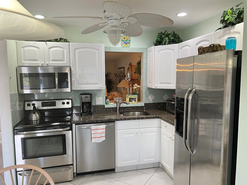 Photo of 6877 Moonlit Drive, Delray Beach, FL 33446 (MLS # R10974726)