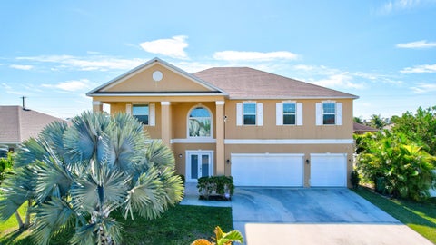 Photo of 1013 SW Eckard Avenue, Port Saint Lucie, FL 34953 (MLS # B26063094)
