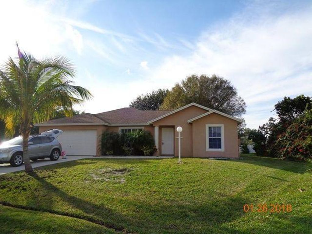 Photo of 593 SW Bailey Ter Terrace, Port Saint Lucie, FL 34953 (MLS # R10723946)