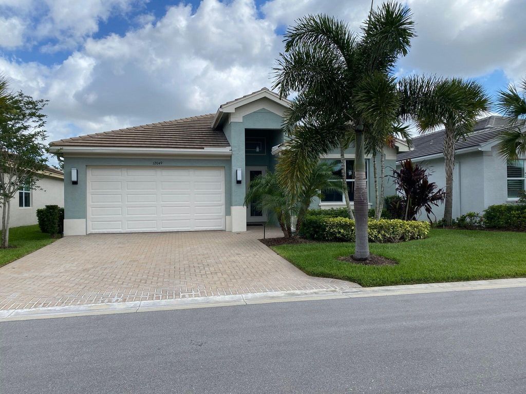 Photo of 12049 SW Jasper Lake Way, Port St Lucie, FL 34987 (MLS # R11104178)