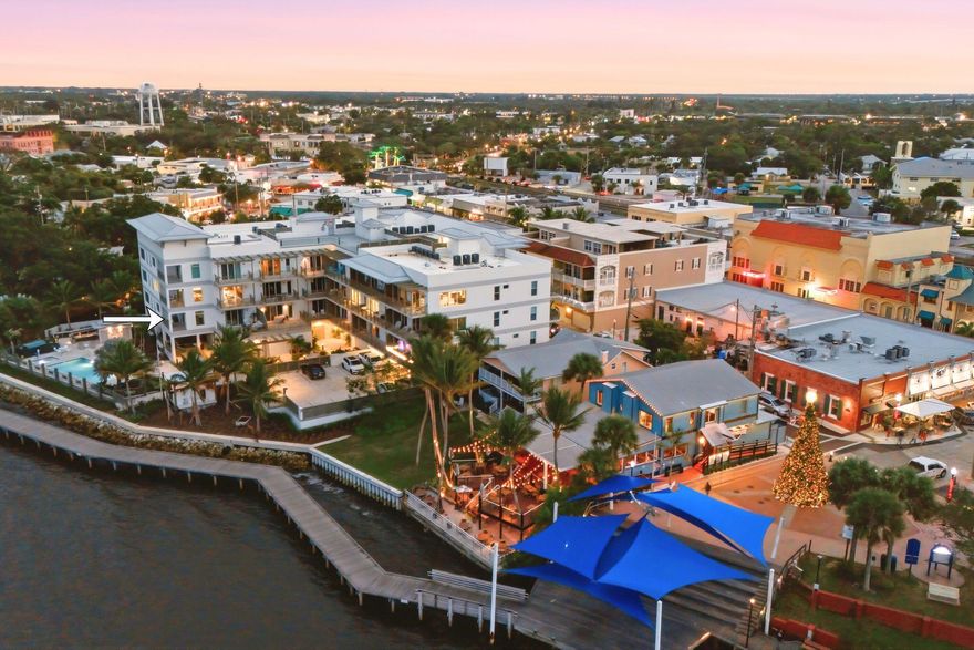 Exclusive Waterfront Property with modern elegance, unmatched water views, premium finishes, and a highly walkable coastal lifestyle, where elevated design meets premier waterfront living in award winning downtown Stuart.  Sailfish Cove is one of downtown Stuart's newest & most coveted luxury waterfront communities, perfectly positioned just steps from acclaimed dining, boutique shopping, live music, and vibrant entertainment. Built with solid CBS construction and full impact glass, these contemporary residences offer the peace of mind, privacy, and quality discerning Buyers expect. From your two private terraces, take in breathtaking, panoramic views of the St. Lucie River, a rare offering, as this floor plan is one of only three in the entire building.