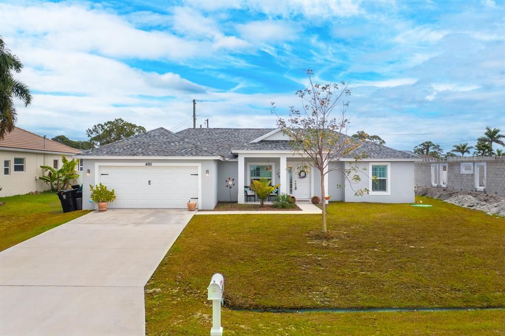 Photo of 4185 SW Belshaw Street, Port St Lucie, FL 34953 (MLS # R10879927)