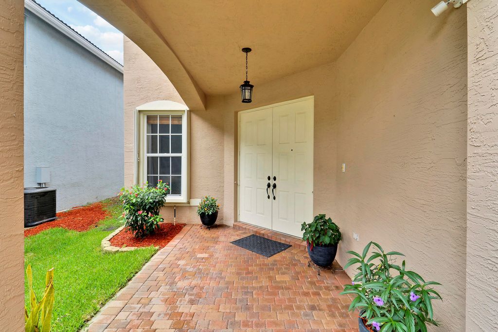 Photo of 5068 Northern Lights Drive, Greenacres, FL 33463 (MLS # B26028809)