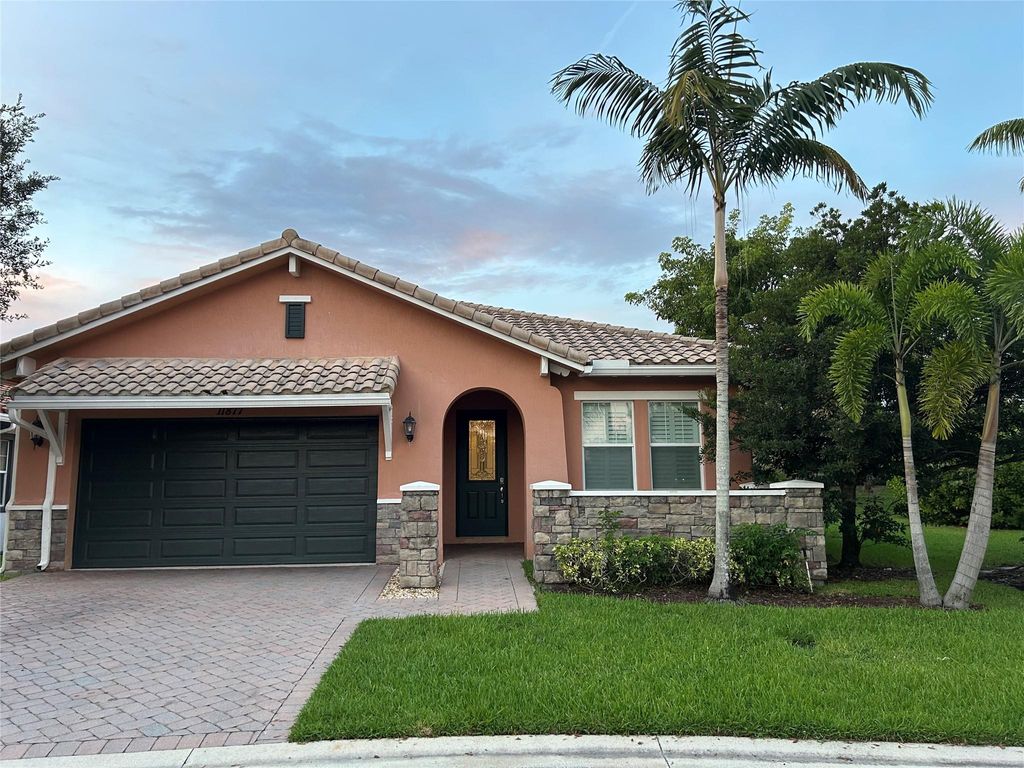 Photo of 11877 NW 83rd Pl, Parkland, FL 33076 (MLS # F10540341)