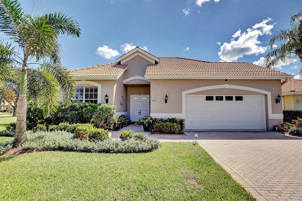 Photo of 631 SW Lake Charles Circle, Port Saint Lucie, FL 34986 (MLS # R10750564)