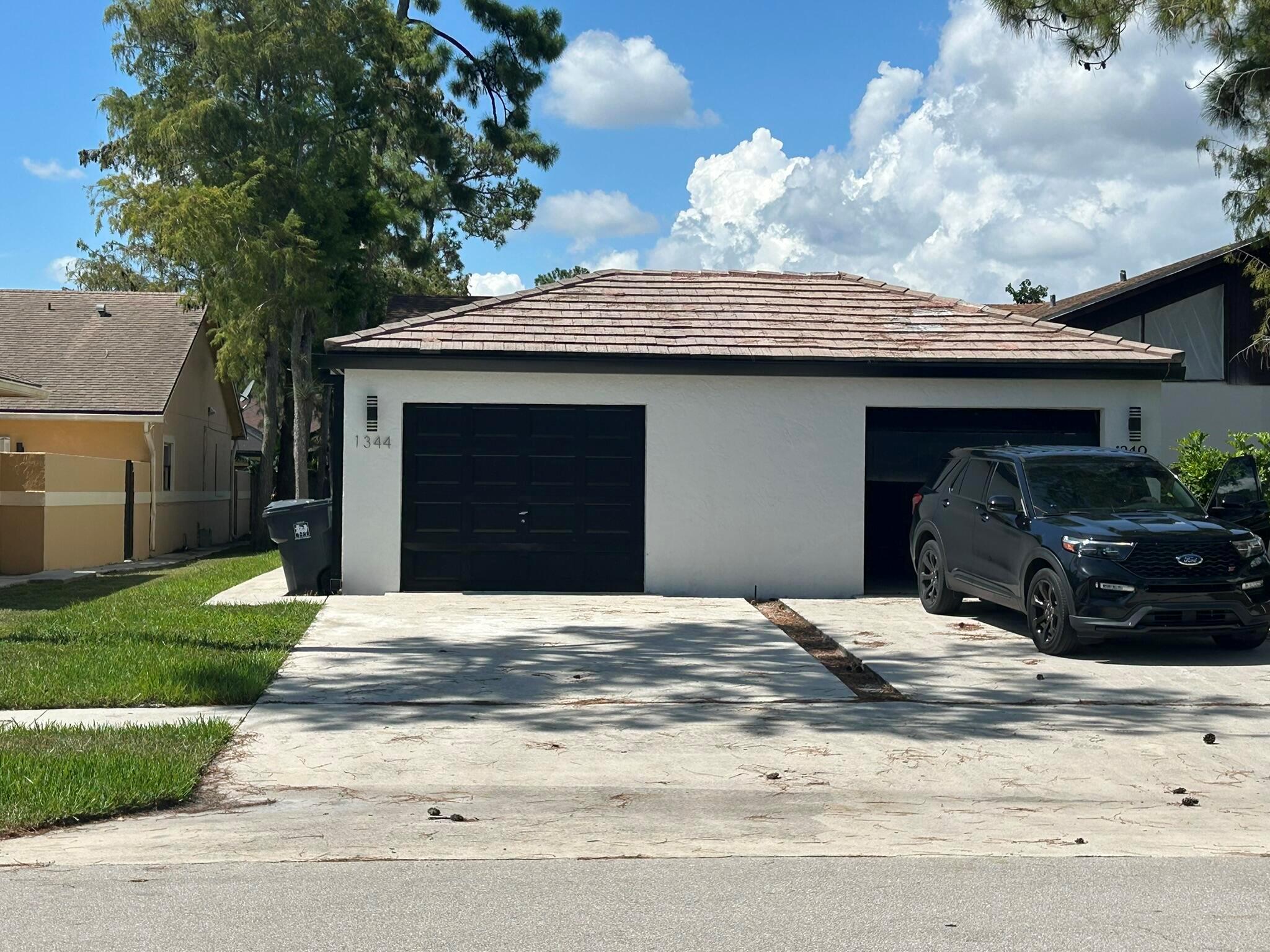 Completely renovated vacant and updated 3 bedroom and 2 bathroom Wellington Villa with screened in back yard pool that's priced to sell quickly. Bring all reasonable offers.