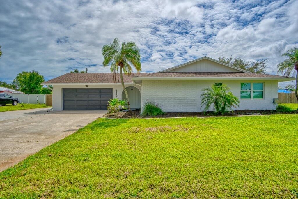 Photo of 1899 SE Adair Street, Port Saint Lucie, FL 34952 (MLS # R11130179)