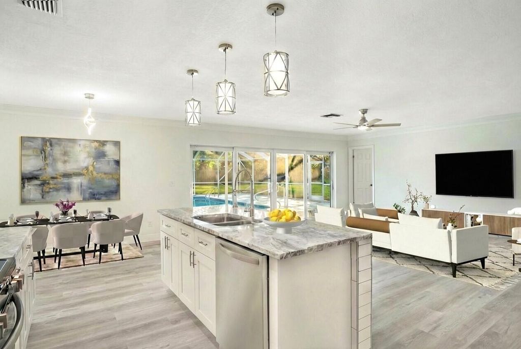 Photo of 1899 SE Adair Street, Port Saint Lucie, FL 34952 (MLS # R11130179)