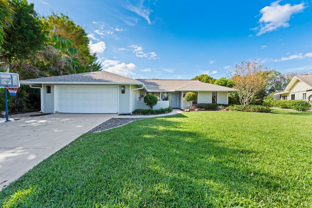 Photo of 8015 SE Trenton Avenue, Hobe Sound, FL 33455 (MLS # B26019999)