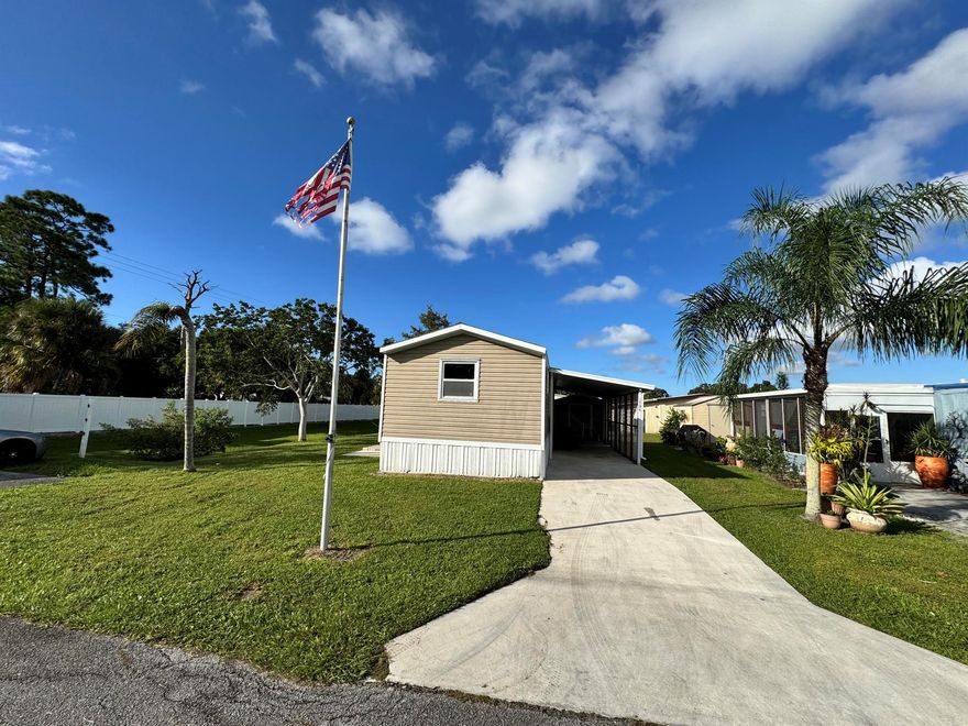 GREAT BUY! Two bedroom, Two bath mobile home with carport and storage shed! Located in the 55+ community of Royal Palm Mobile Home Park! New kitchen, new floors, new siding, new appliances, more upgrades than you can count! Split floor plan! This is a land lease community with lot rent $750 per month. Great location near I95.