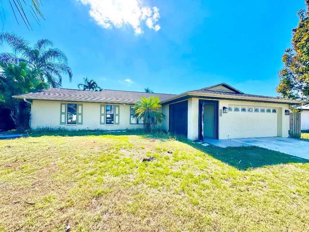 Photo of 190 SW Ray Avenue, Port Saint Lucie, FL 34953 (MLS # R11140851)