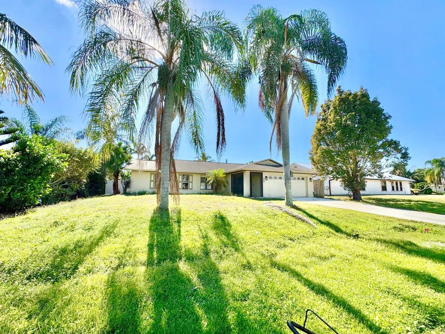 Don't miss this opportunity. 3/2, CBS Pool Home with new AC, new duct work, new water heater and brand new $1600.00 pool pump. Privacy fenced back yard with a giant screened area that is perfect for entertaining and the pool is in great shape, it just needs to be cleaned. CBS with impact garage door and accordion shutters on the entire rear of home. Primary Ensuite has dual sinks with granite countertops and large soaking tub with custom tiled walls and glass shower door. Guest bath has a custom tiled shower, granite countertops and functions as a cabana bath. Tile throughout and every bedroom has its own walk-in closet. Large, tiled, screened porch covers the entry and the home sits very high. Great location, right by Crosstown Prkwy, close to everything, easy commute to Palm Beach.