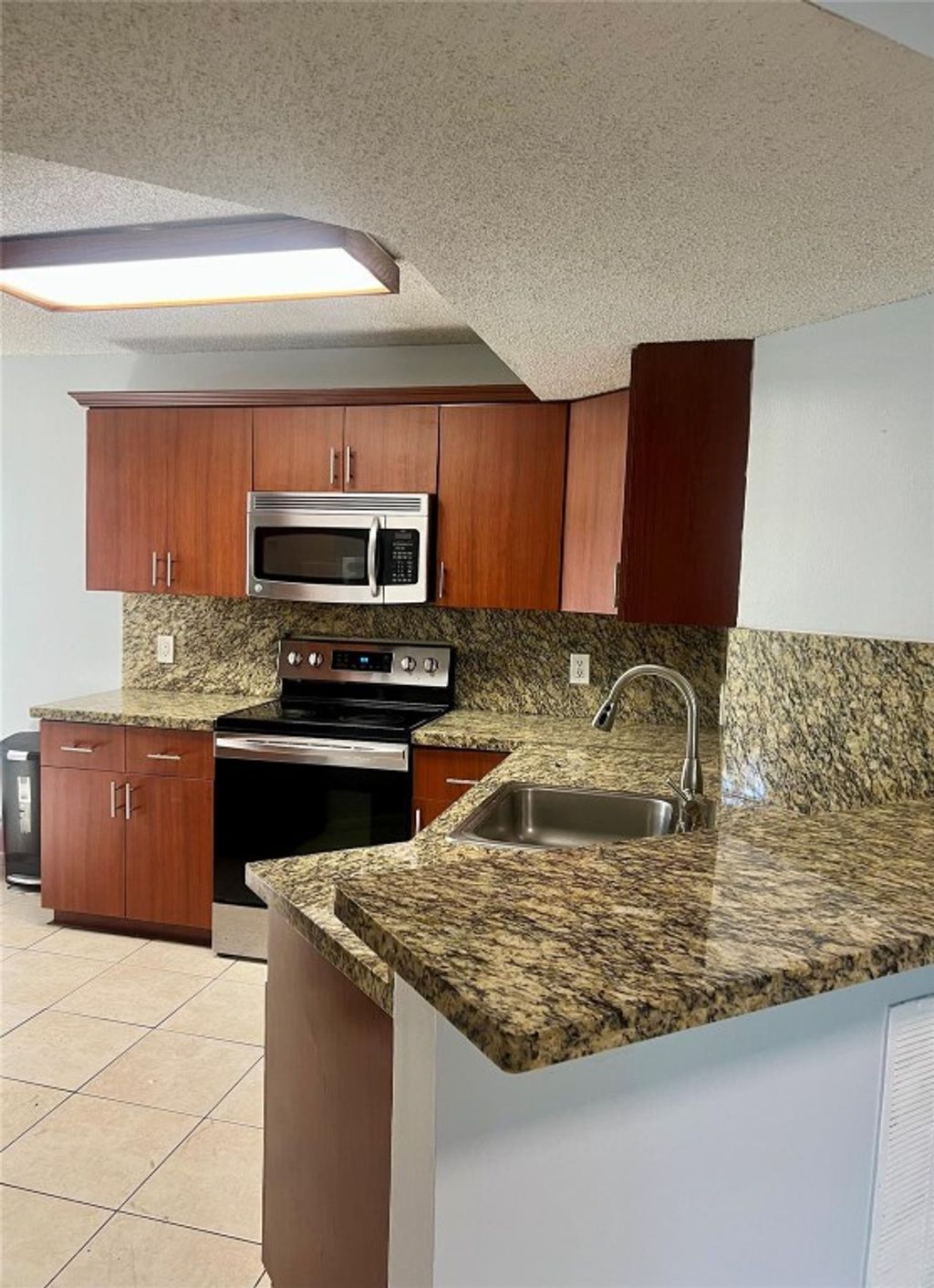 Photo of 8821 Wiles Road #108, Coral Springs, FL 33067 (MLS # F10511794)