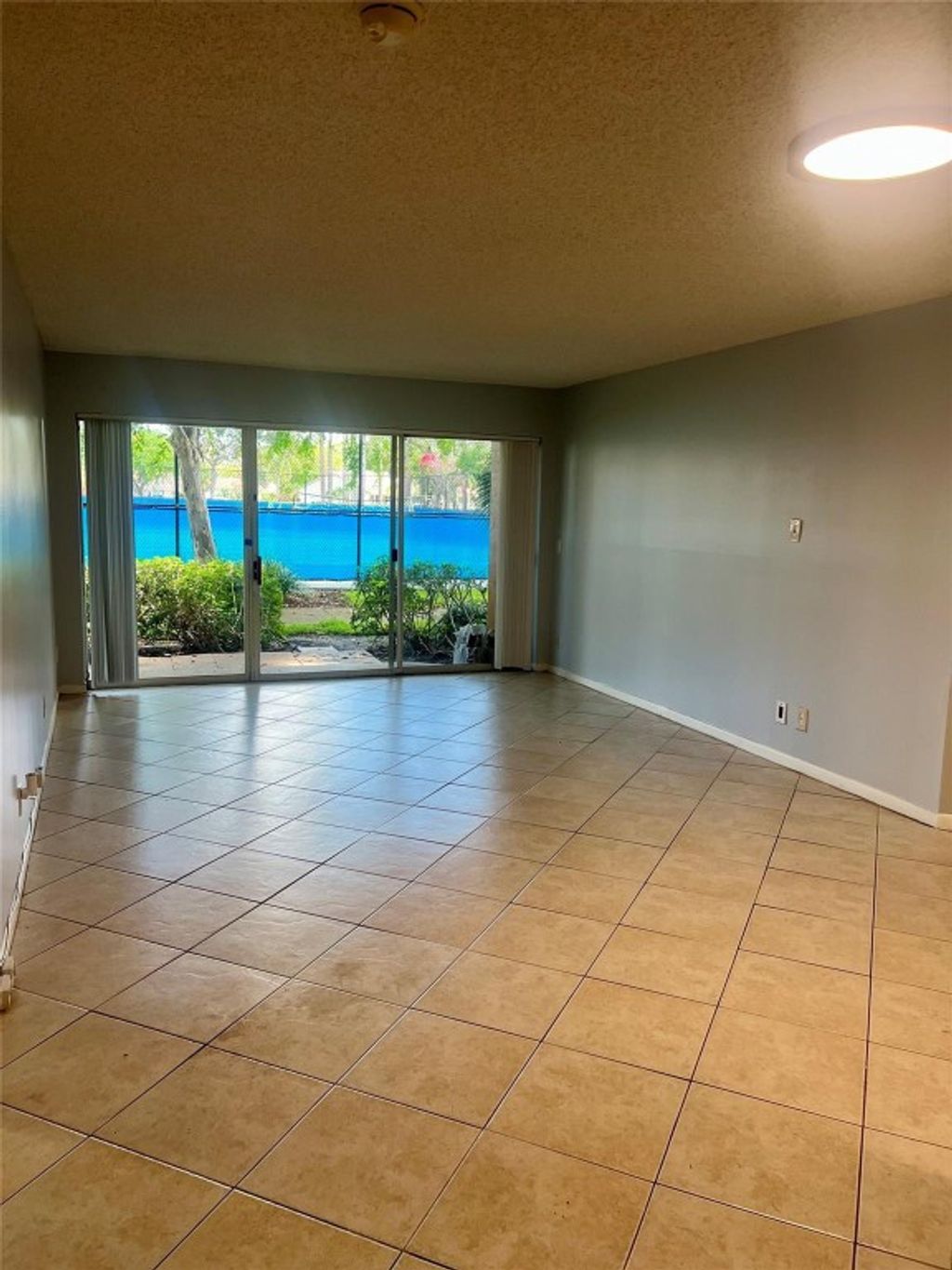 Photo of 8821 Wiles Road #108, Coral Springs, FL 33067 (MLS # F10511794)