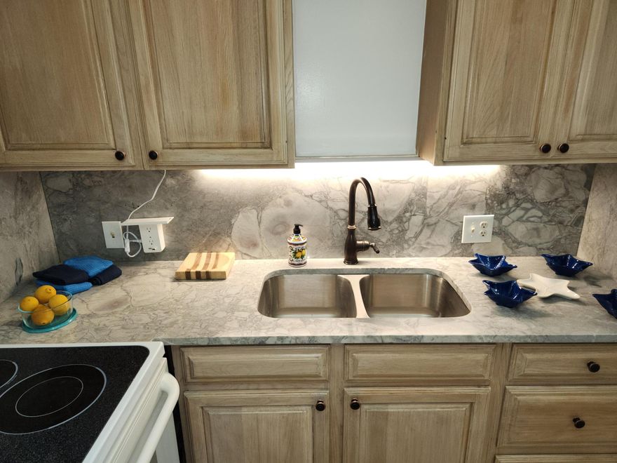 Bright, clean, and updated 1-bedroom, 1-bathroom condo for rent in the resort style, guard-gated Century Village (adult 65+ community) in Boca Raton is available for immediate move-in. Located close to the elevator, laundry, and pool. Offered for an annual lease at $1,500 per month (unfurnished or partially furnished), the residence features a marble and tile bathroom with a new walk-in shower and a kitchen with marble countertops and wood cabinetry. Residents have access to resort-style amenities from tennis, pools, theatre and more located near local shopping and dining. Courtesy bus service available! Move-in requires association approval, a signed lease, first and last month's rent, and a security deposit. No smokers.