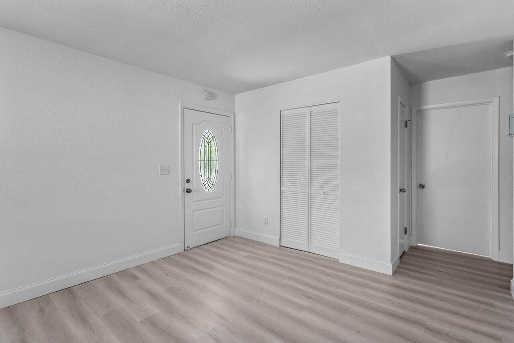 Photo of 3415 W Lake Drive, Fort Pierce, FL 34982 (MLS # R10972226)