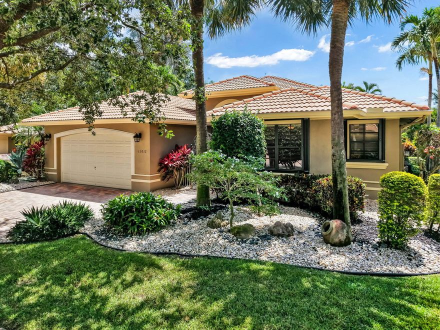 Situated on an exceptional corner lot this meticulously maintained Palazzo Roma model with 2,821 sq.ft under air features four bedrooms, three full-baths, two car garage & offers a seamless blend of sophistication and comfort. Desirable split-bedroom plan, the fourth bedroom w/a custom built-in murphy bed & office, creating a perfect office space. The heart of the home has a spacious chef's kitchen featuring quartz countertops, abundant cabinetry, and an open-concept design that overlooks the family room, creating the perfect setting for relaxing and entertaining. Additional premium features include accordion shutters, whole-house generator, whole-house water purification system. Step outside to a screened in patio & open patio overlooking a tropical oasis picturesque pond &  waterfall.