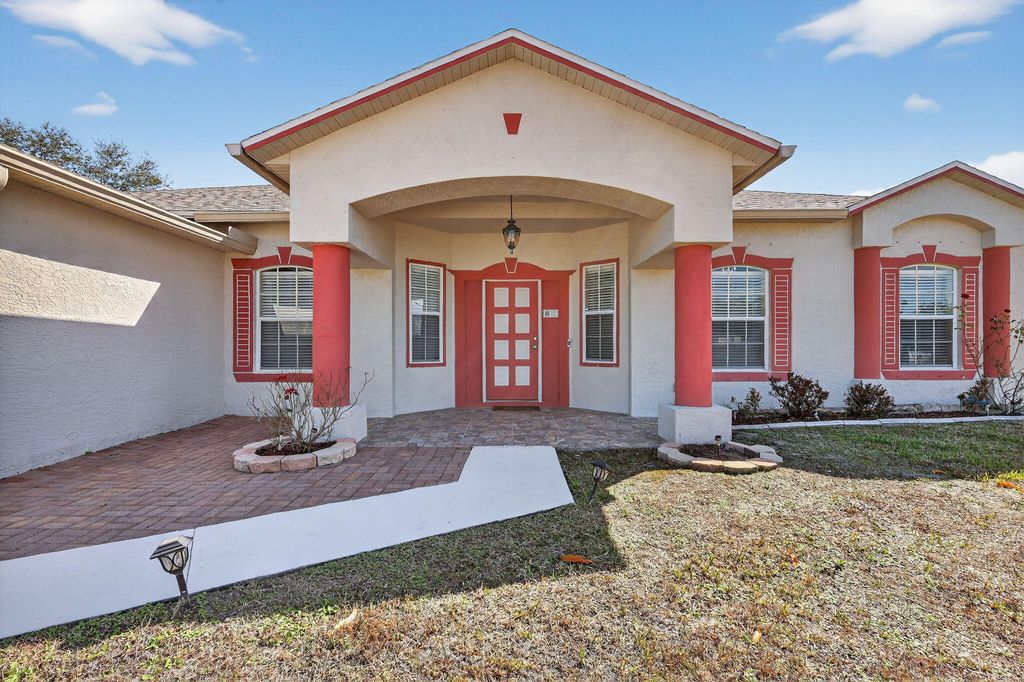 Photo of 6871 NW Hogate Circle, Port Saint Lucie, FL 34983 (MLS # R11162664)