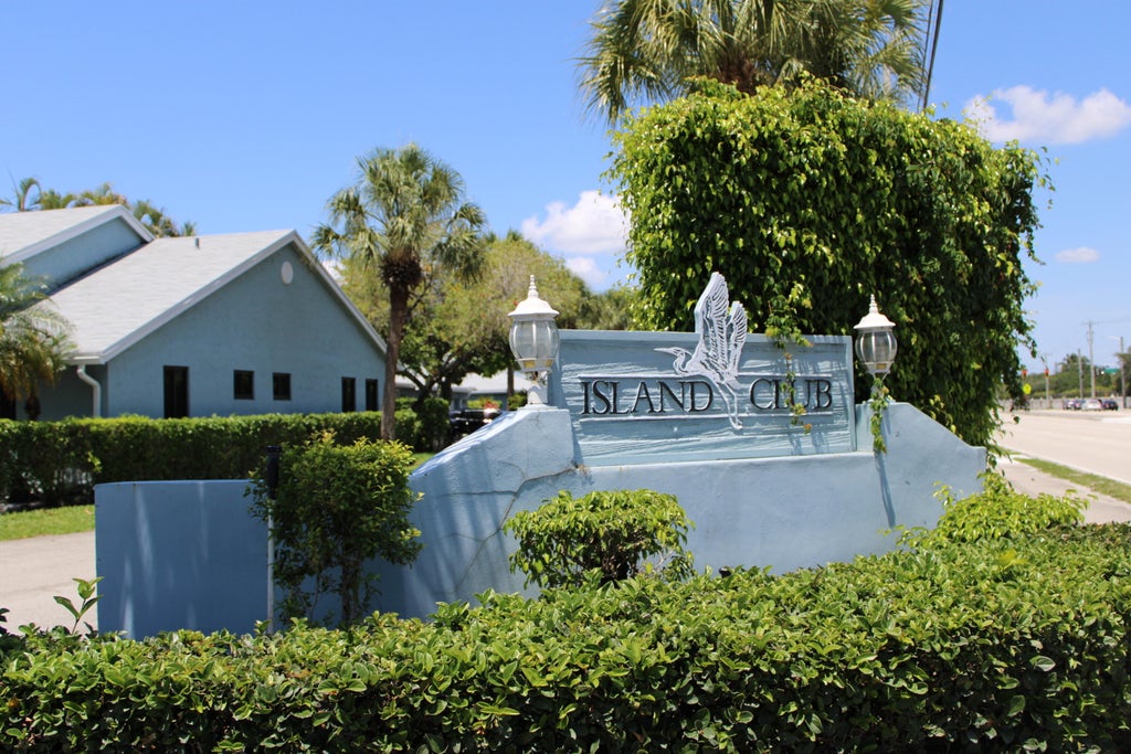 Photo of 3883 Island Club Circle W, Lake Worth Beach, FL 33462 (MLS # B26031281)