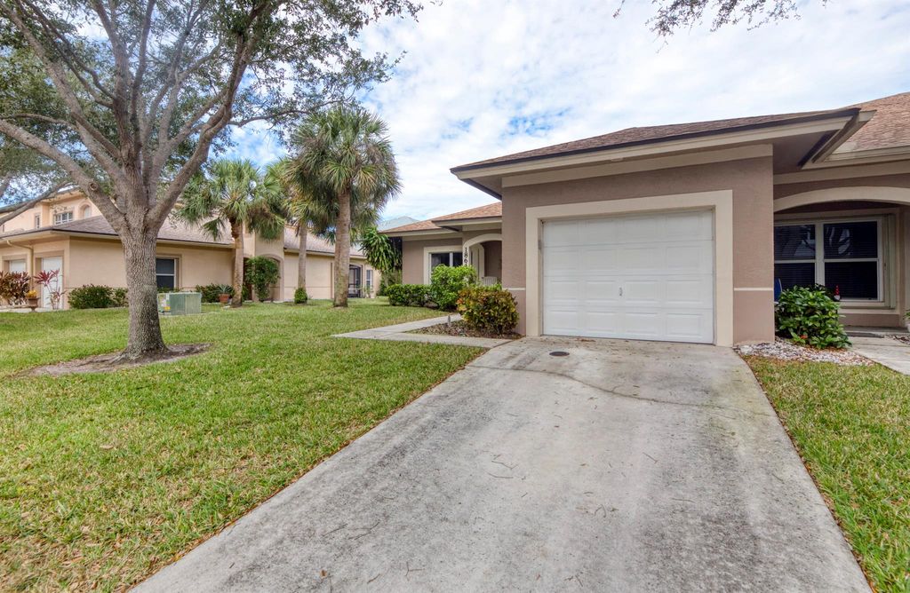 Photo of 1864 S Dovetail Drive #A1, Fort Pierce, FL 34982 (MLS # R11144860)