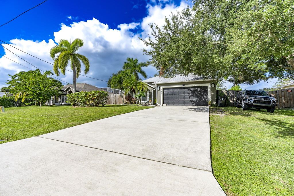 Photo of 925 SW Nichols Terrace, Port Saint Lucie, FL 34953 (MLS # R11134047)