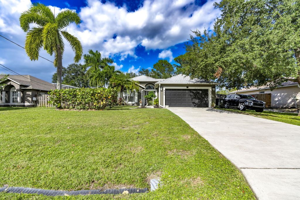 Photo of 925 SW Nichols Terrace, Port Saint Lucie, FL 34953 (MLS # R11134047)