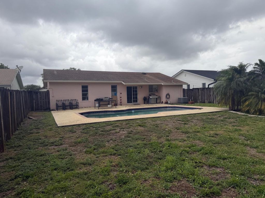 Photo of 10862 NW 23rd Court, Sunrise, FL 33322 (MLS # B26026855)