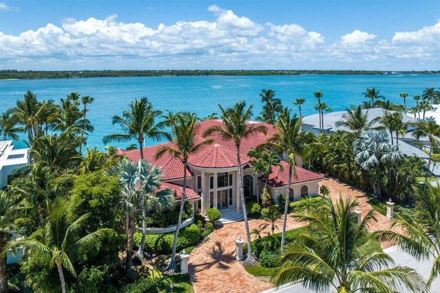 Welcome to this exquisite Mediterranean estate home, perfectly nestled along the breathtaking St. Lucie Inlet. Immerse yourself in the awe-inspiring vistas of the intracoastal waterway and the majestic ocean that this exceptional residence offers. With its grandeur and elegance reminiscent of a mansion, this stunning property features four generously appointed bedrooms and six lavishly designed bathrooms.
