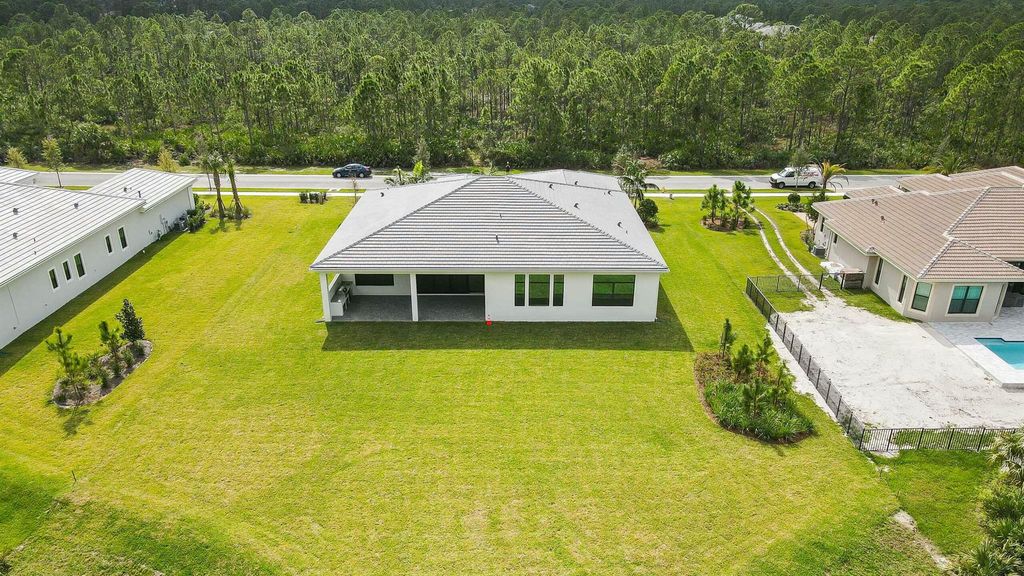 Photo of 5118 SW Pomegranate Way, Palm City, FL 34990 (MLS # R11046975)