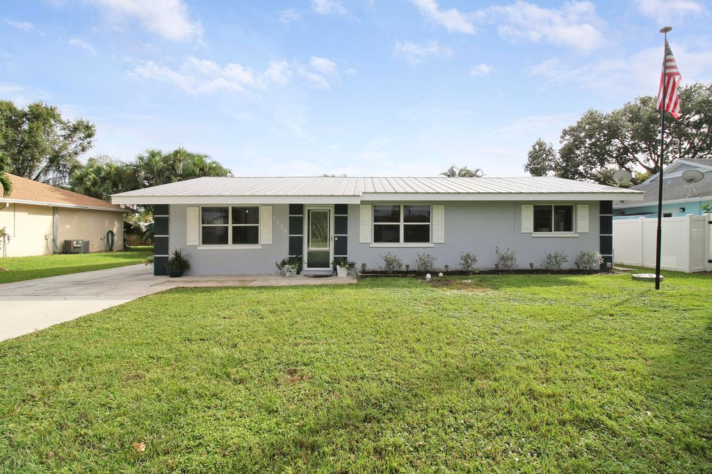 Photo of 1134 NW 14th Street, Stuart, FL 34994 (MLS # R11029946)