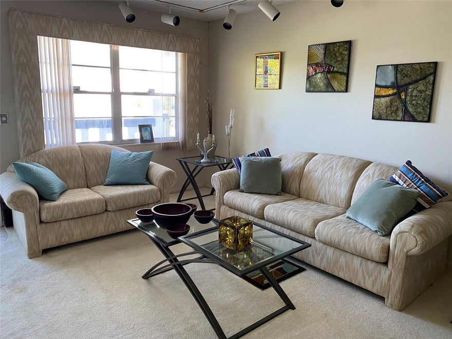 RARE CORNER UNIT! 4TH FLOOR, VERY LIGHT AND BRIGHT,  2 BEDROOM 2 FULL BATH, NEWER EAT IN KITCHEN WITH ADJACENT MIRROR DINING AREA. PARTIALLY FURNISHED, SCREEN IN PATIO WITH PULL DOWN SHUTTERS. MASTER BATH HAS TUB/SHOWER COMBO GUEST BATH HAS WALK IN SHOWER. BEAUTIFUL GARDEN VIEW, FROM SCREENED IN PATIO WITH PULL DOWN SHUTTERS. UNIT IS SHORT WALK TO PLAZA AND UPMINSTER POOL. CLUBHOUSE HAS LIVE THEATER SHOWS, STATE OF THE ART FITNESS CENTER, NEW PICKLE BALL COURTS, CLUB AND CRAFT ROOMS, INDOOR POOL, AND CAFE ON PROPERTY. SHUTTLE SERVICE TO MALLS AND GROCERY STORES. FINE DINING AND SHOPPING NEAR BY.  THIS IS A NON RENTAL BUILDING PROOF OF FUNDS MUST ACCOMPANY ALL OFFERS. EASY TO SHOW ON SHOWTIME.