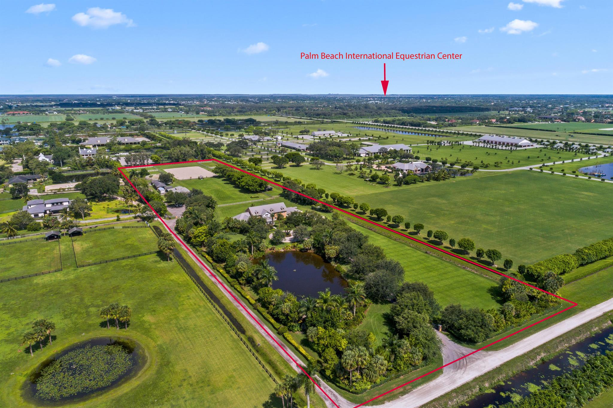 Spectacular 10 acre farm with two barns, 15 stalls total, staff quarters, large all-weather arena, round pen, plenty of turnout with 7 large paddocks plus a beautiful riding field. Home completely redone by one of Wellington's top builders and top interior designers, this home is sure to please. Too many state of the art extras to list include impact glass, and gas range. Farm shows beautifully you will not be disappointed.