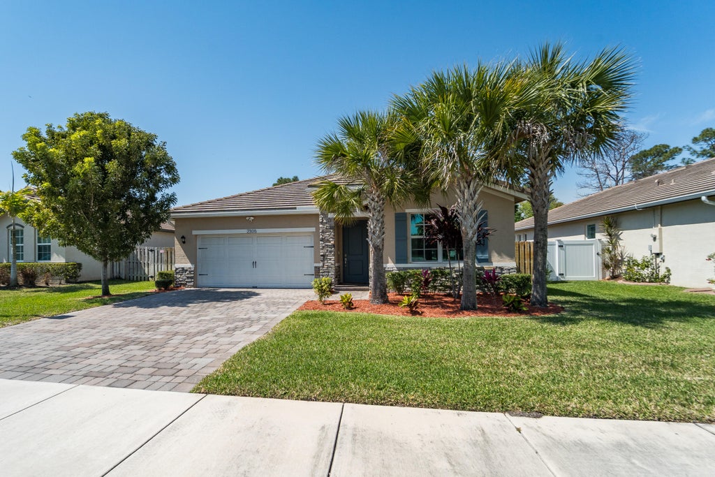 Photo of 2305 SW Strawberry Terrace, Palm City, FL 34990 (MLS # R11063026)