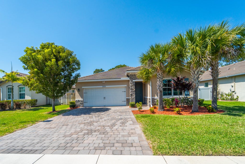 Photo of 2305 SW Strawberry Terrace, Palm City, FL 34990 (MLS # R11063026)