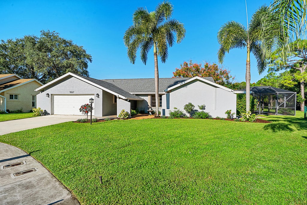 Photo of 5527 Adair Way, Lake Worth, FL 33467 (MLS # B26089474)